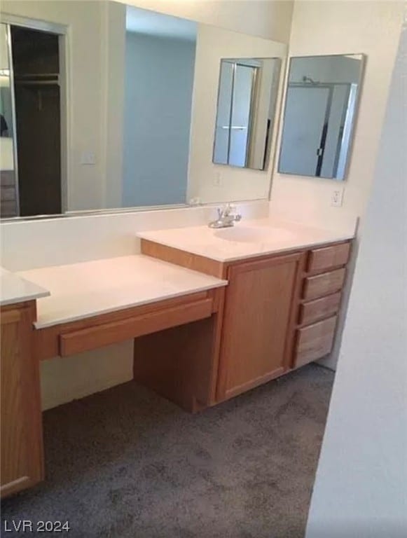 bathroom featuring oversized vanity