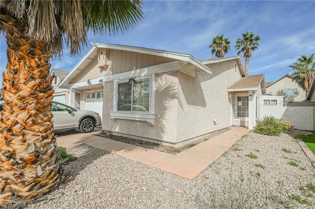 view of home's exterior with a garage