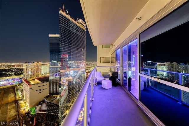 view of balcony at twilight