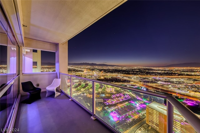 view of balcony at twilight