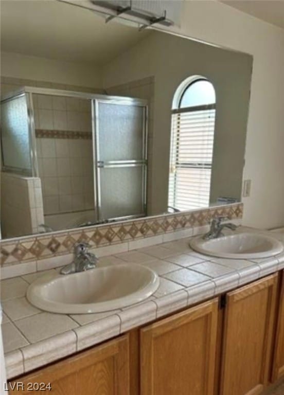 bathroom with double vanity