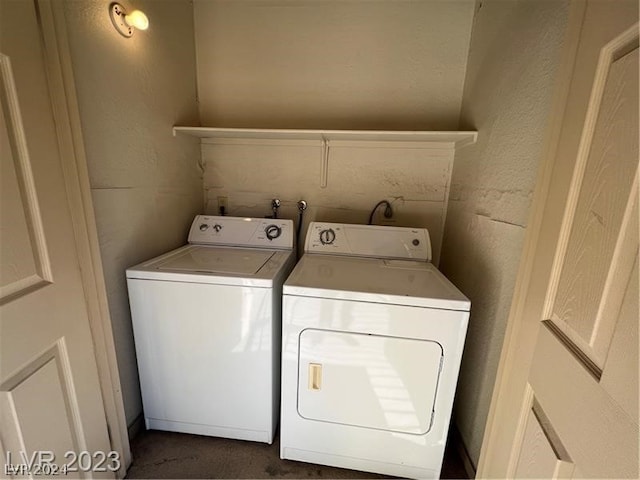 washroom featuring washing machine and dryer