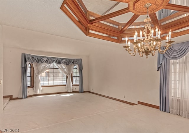 carpeted spare room with a high ceiling and a notable chandelier