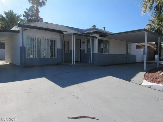 view of front of house featuring a carport