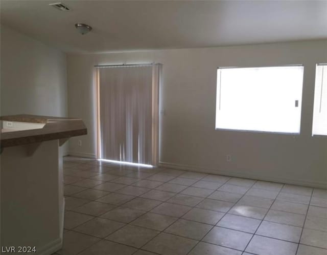 view of tiled empty room