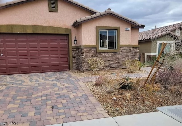 view of front of home featuring a garage