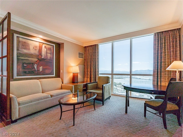 carpeted living room with a water view, expansive windows, and ornamental molding