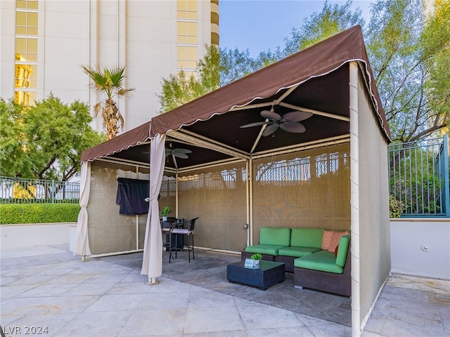 view of patio featuring outdoor lounge area and ceiling fan