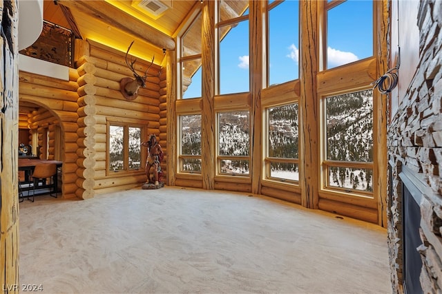 interior space with a stone fireplace