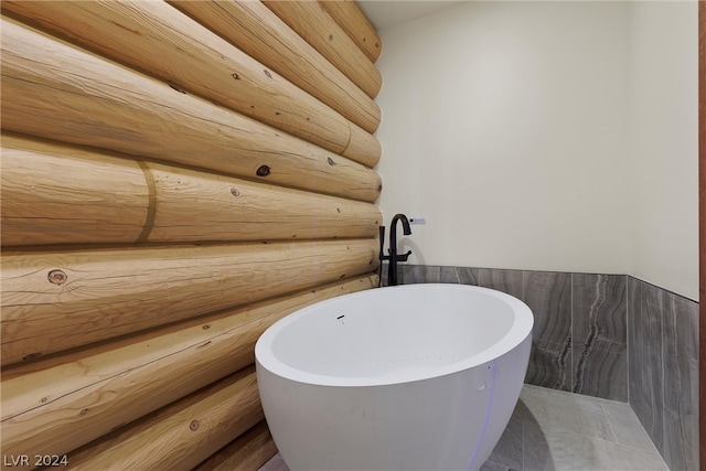 bathroom featuring log walls