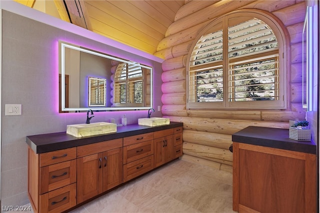 bathroom featuring tile flooring, rustic walls, wooden ceiling, and vanity