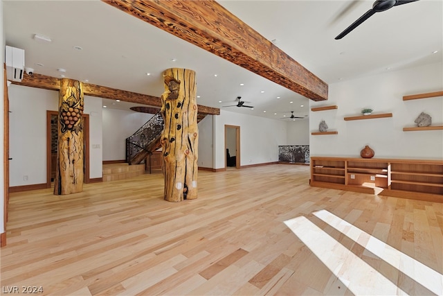 interior space with ceiling fan and light hardwood / wood-style flooring