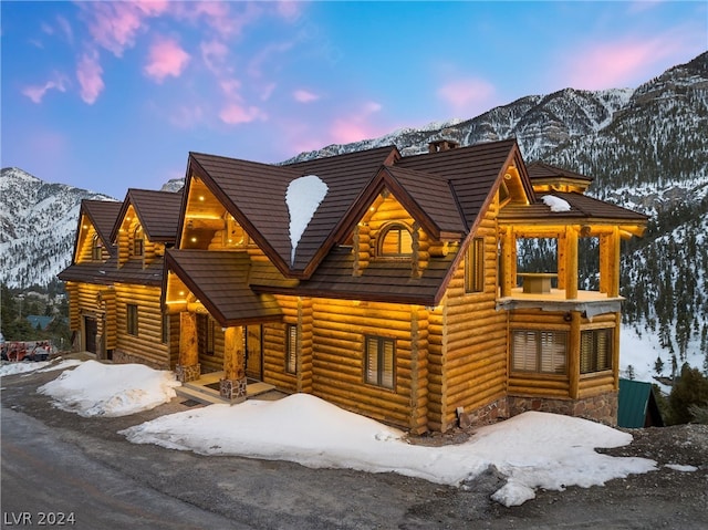 log-style house featuring a mountain view