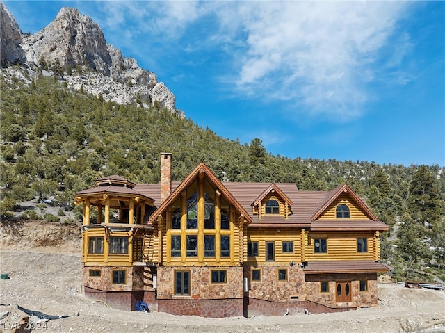 view of front of house with a mountain view