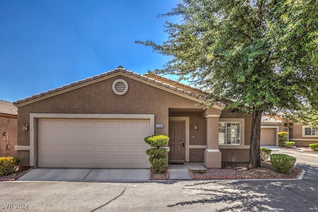 view of front of home featuring a garage