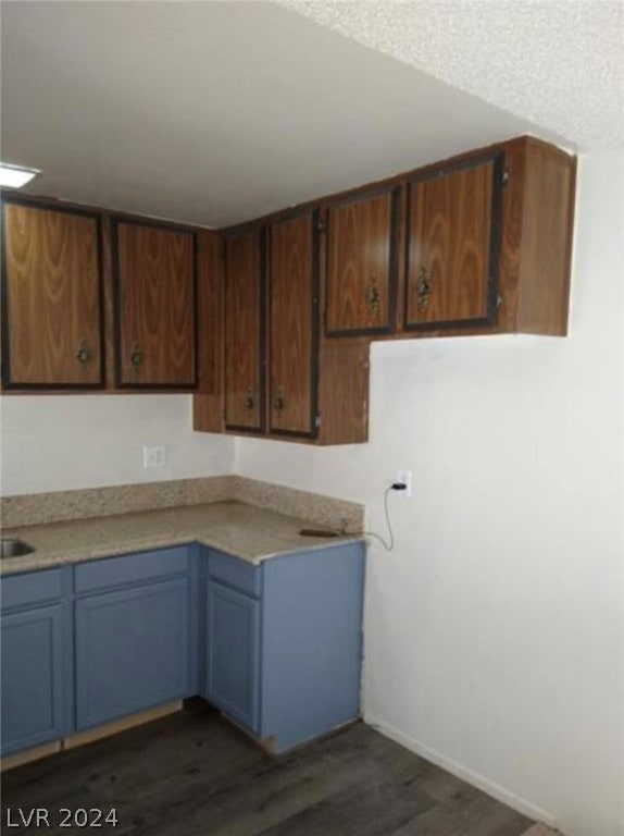 kitchen featuring dark hardwood / wood-style flooring