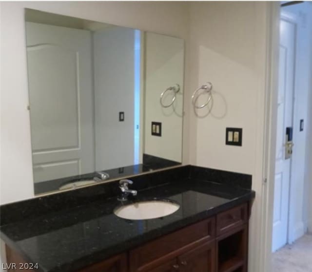 bathroom featuring oversized vanity