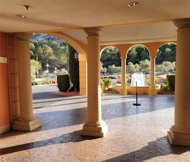 doorway to outside with decorative columns