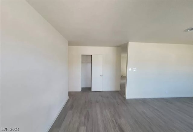 empty room featuring dark hardwood / wood-style floors