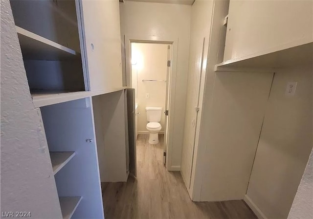 hallway featuring light hardwood / wood-style flooring