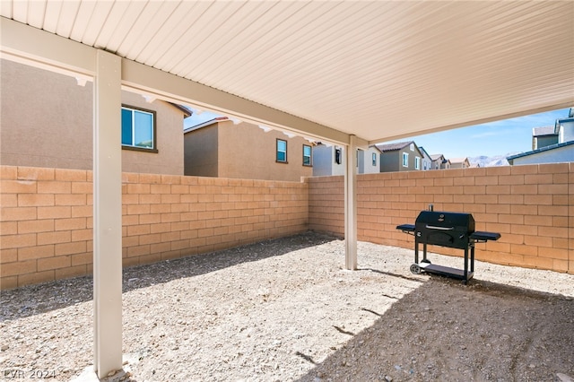 view of terrace with a grill