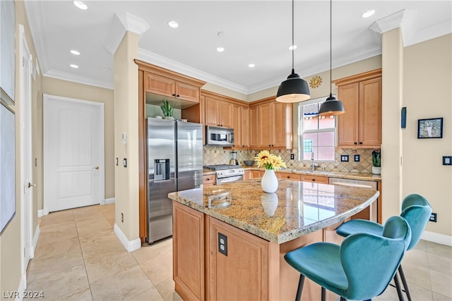 kitchen with tasteful backsplash, stainless steel appliances, and a kitchen island