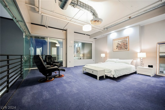 bedroom with dark colored carpet and ceiling fan