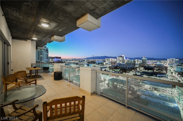 view of balcony at dusk