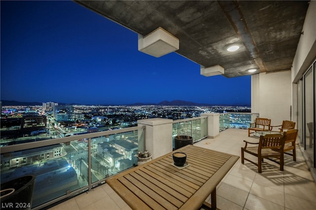 view of balcony at twilight