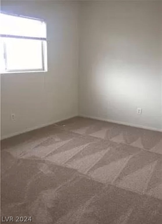 empty room featuring carpet