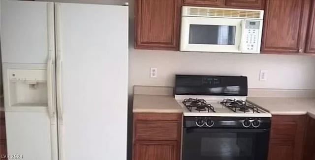 kitchen featuring white appliances