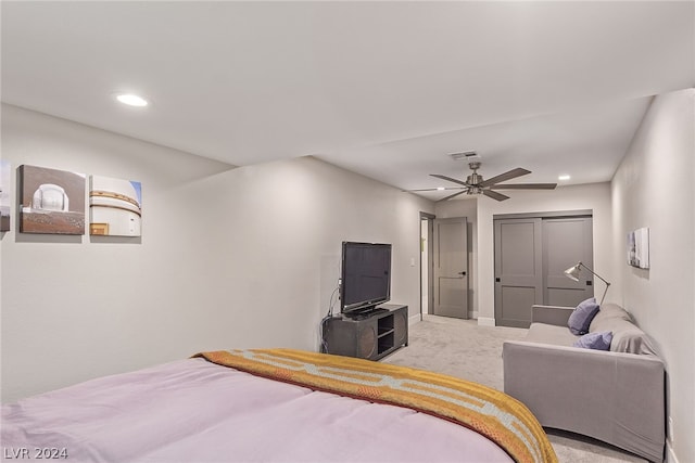 bedroom featuring light carpet, baseboards, visible vents, a ceiling fan, and recessed lighting