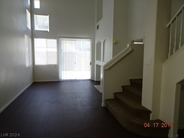 interior space with a towering ceiling