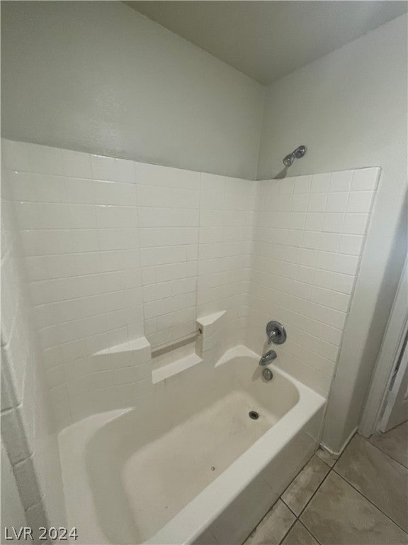 bathroom featuring shower / bathing tub combination and tile patterned floors