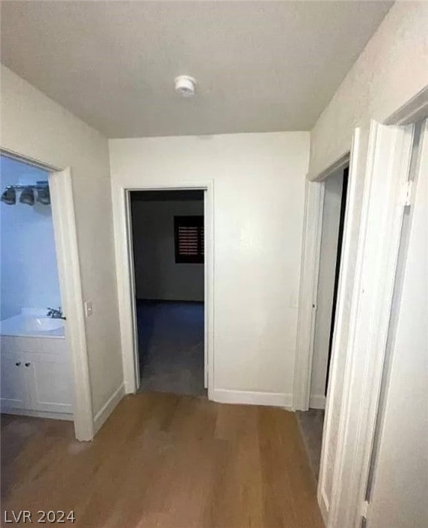 hallway featuring light hardwood / wood-style flooring