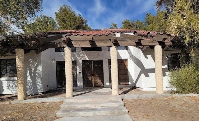 exterior space featuring a pergola