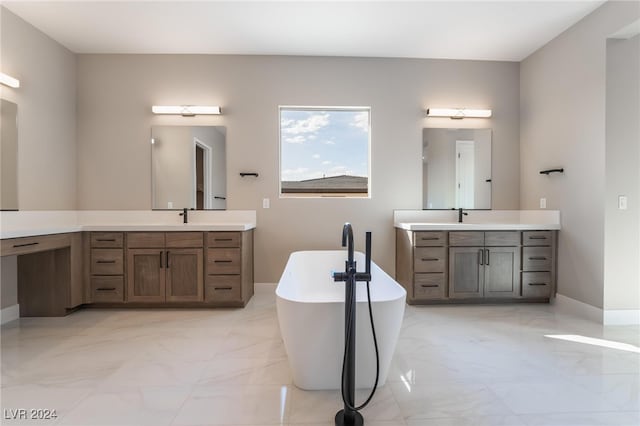 bathroom featuring a bathtub and vanity