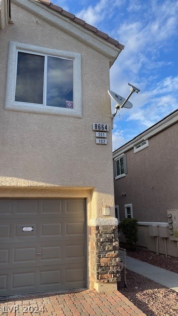 view of home's exterior featuring a garage