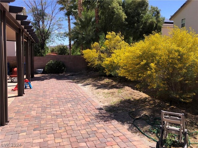 view of patio with fence