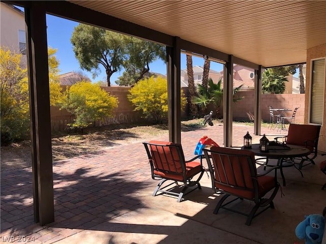 view of patio / terrace featuring a fenced backyard and outdoor dining space