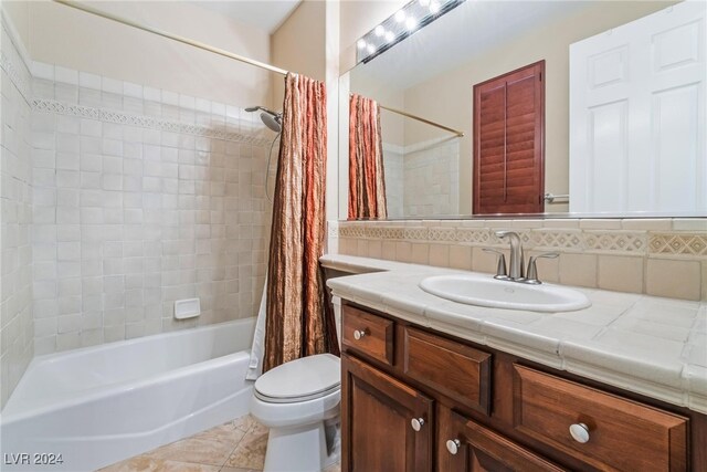 full bathroom featuring shower / bathtub combination with curtain, backsplash, tile patterned floors, toilet, and vanity