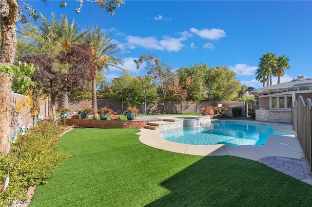 view of pool with a lawn