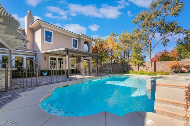 view of swimming pool with a patio