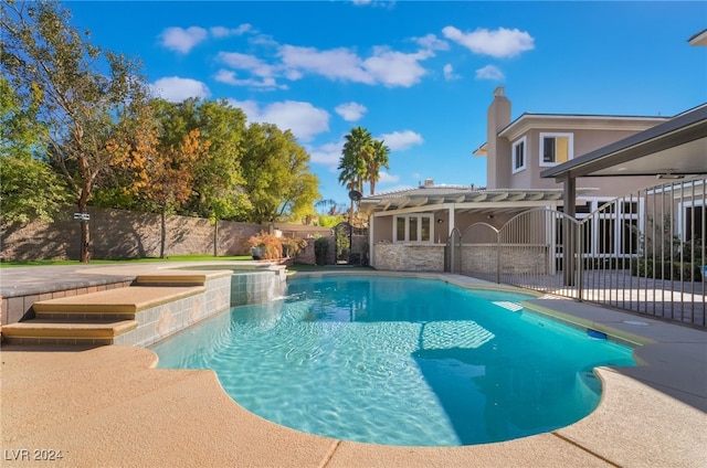 view of swimming pool featuring a patio area