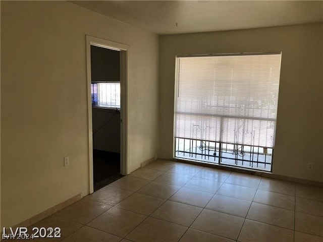 view of tiled spare room