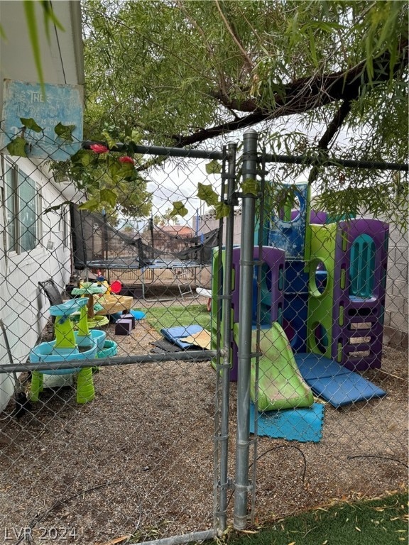 view of jungle gym with central air condition unit