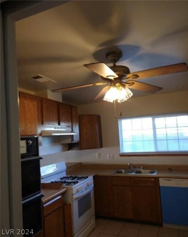 kitchen with ceiling fan, sink, gas range gas stove, dishwasher, and extractor fan