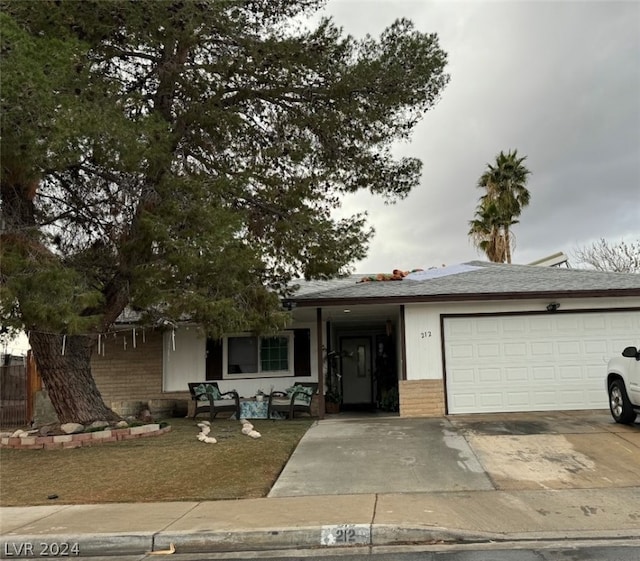 view of front of home with a garage