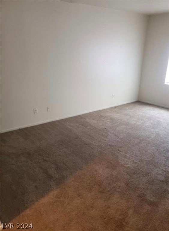 unfurnished room featuring carpet floors