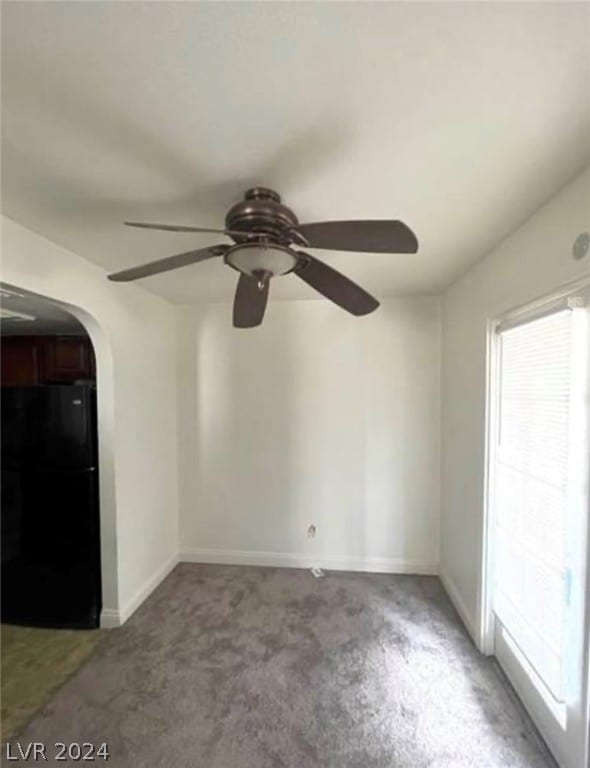 spare room with ceiling fan